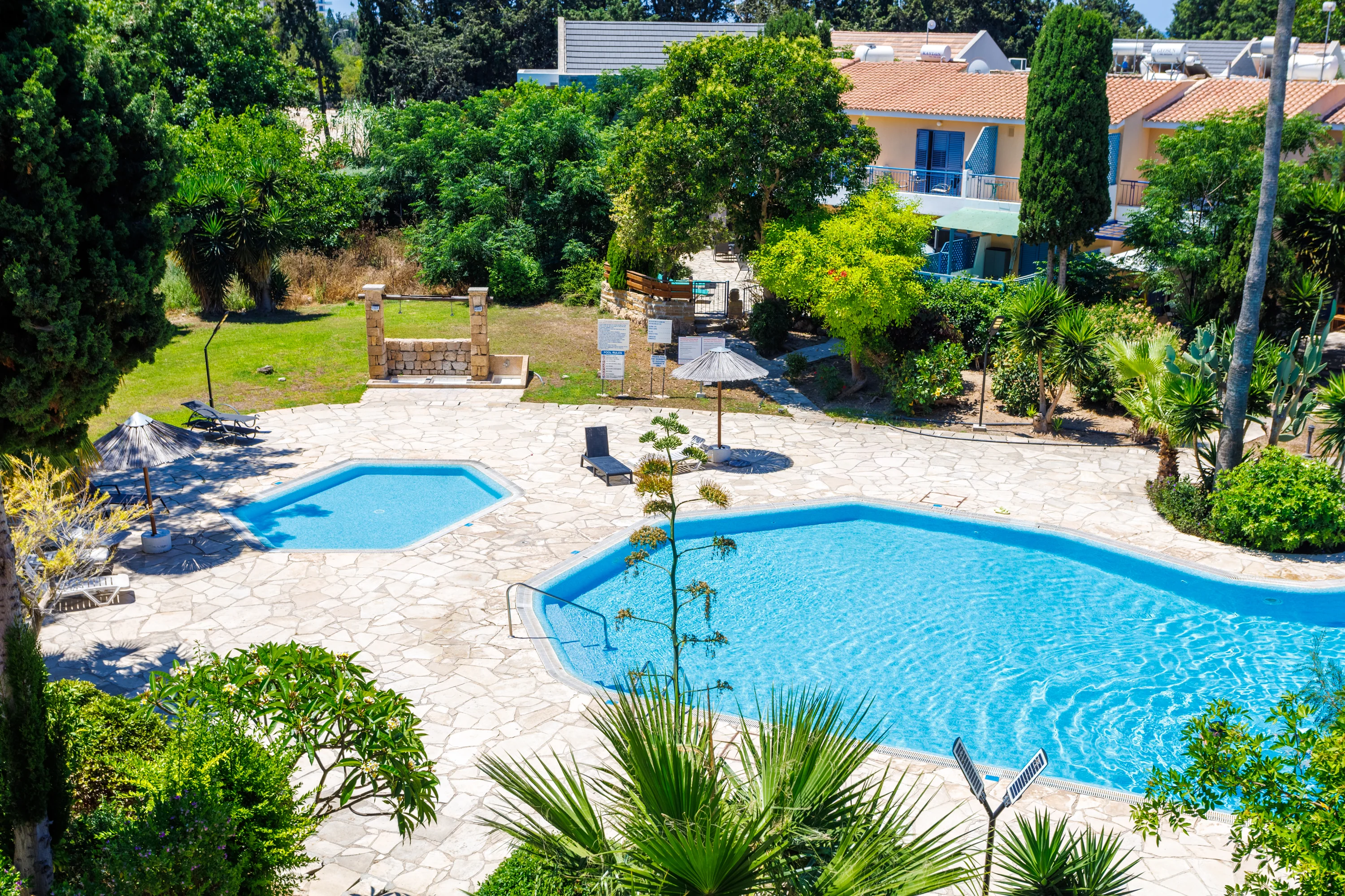 Two swimming pools and gardens at Paradise Gardens