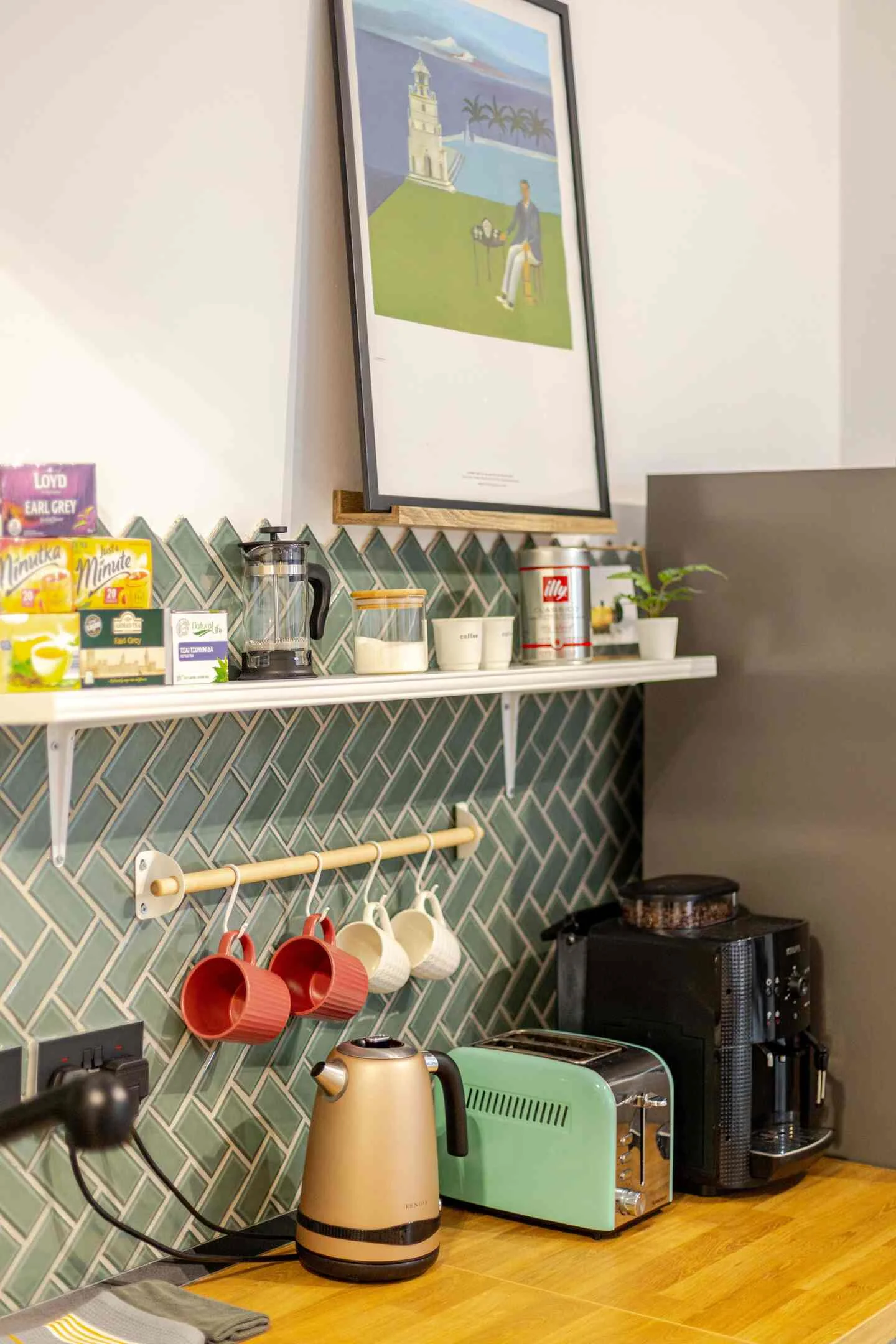 Coffee and tea station with kettle, toaster and coffee machine