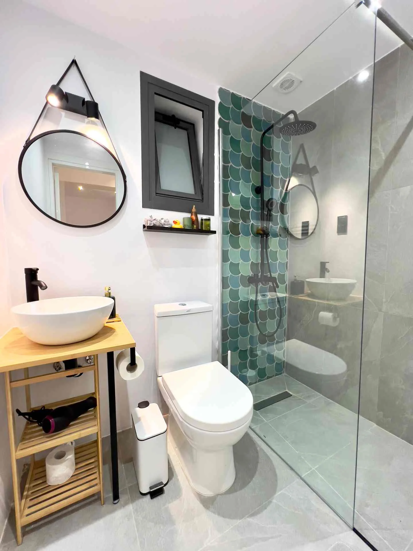 Walk-in rain shower with fish-scale tiles