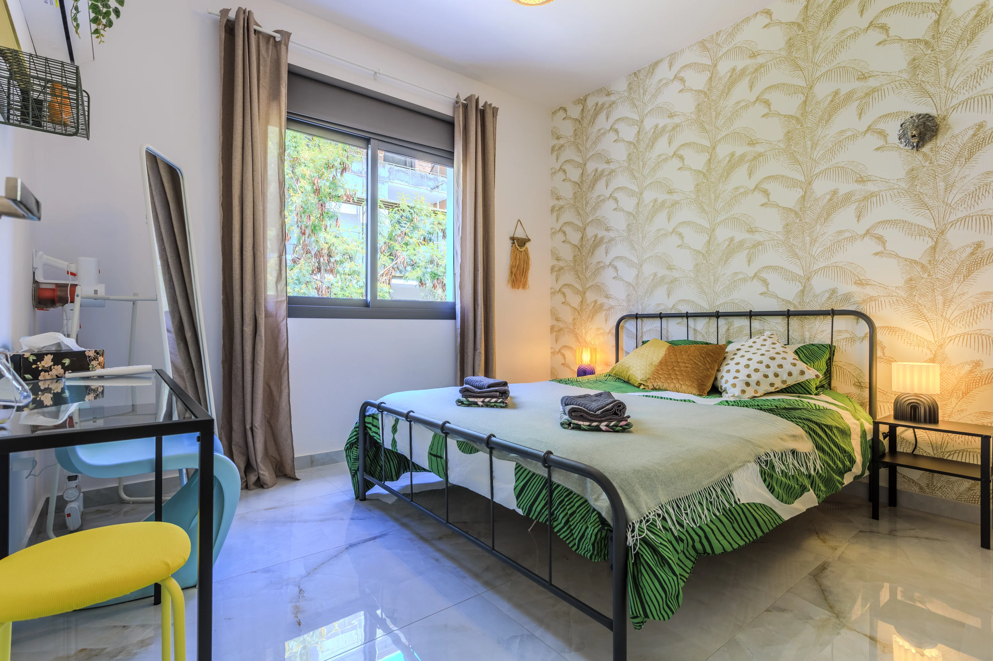 Bedroom with double bed and desk