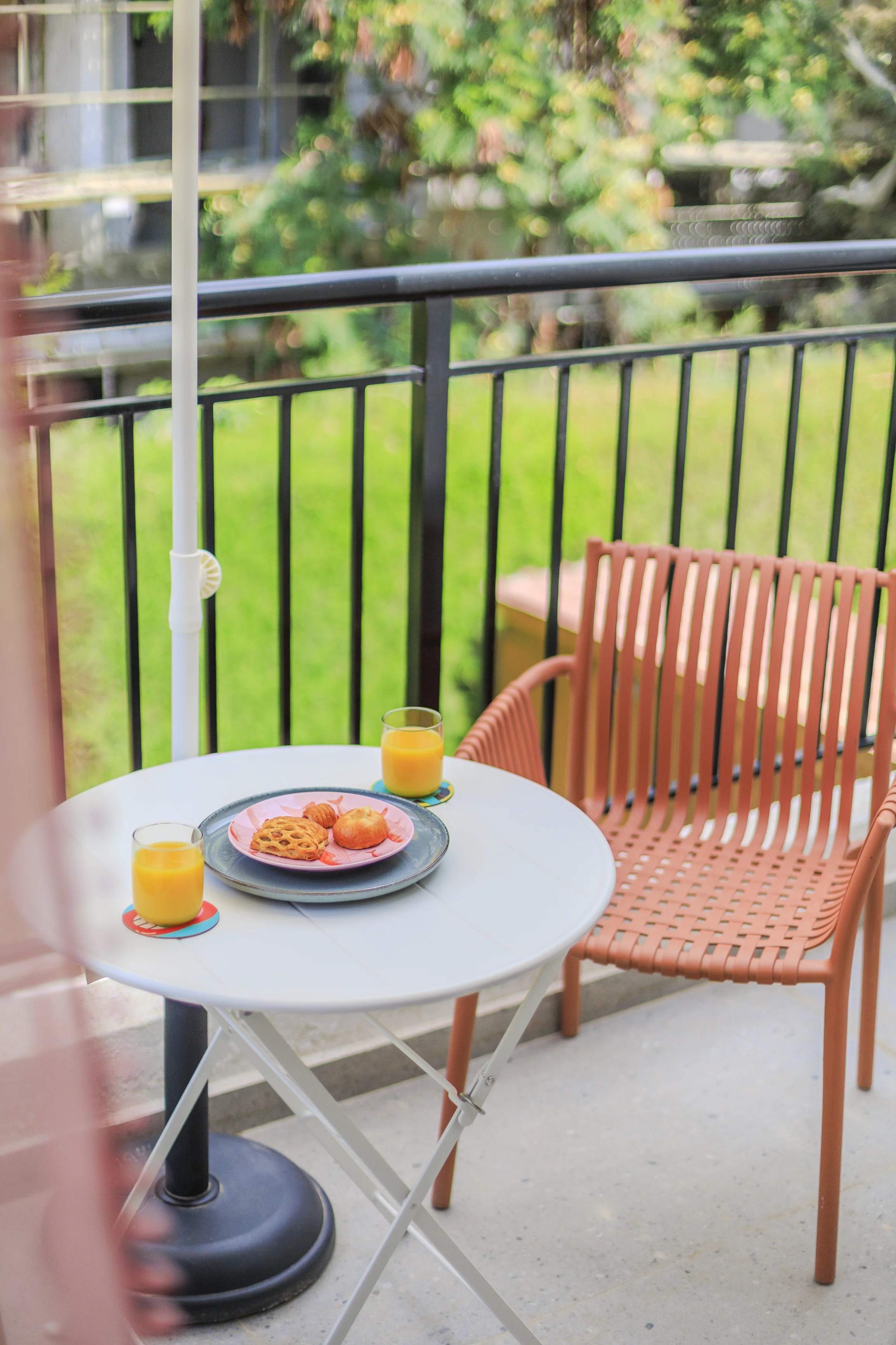 Balcony table set for breakfast