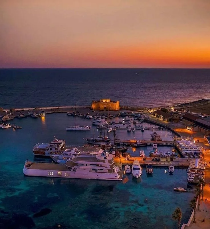 Paphos Castle and the marina at sunset